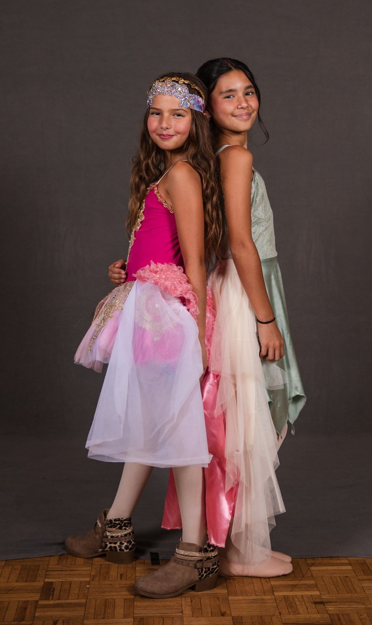 Two dancers in pink and mint tulle