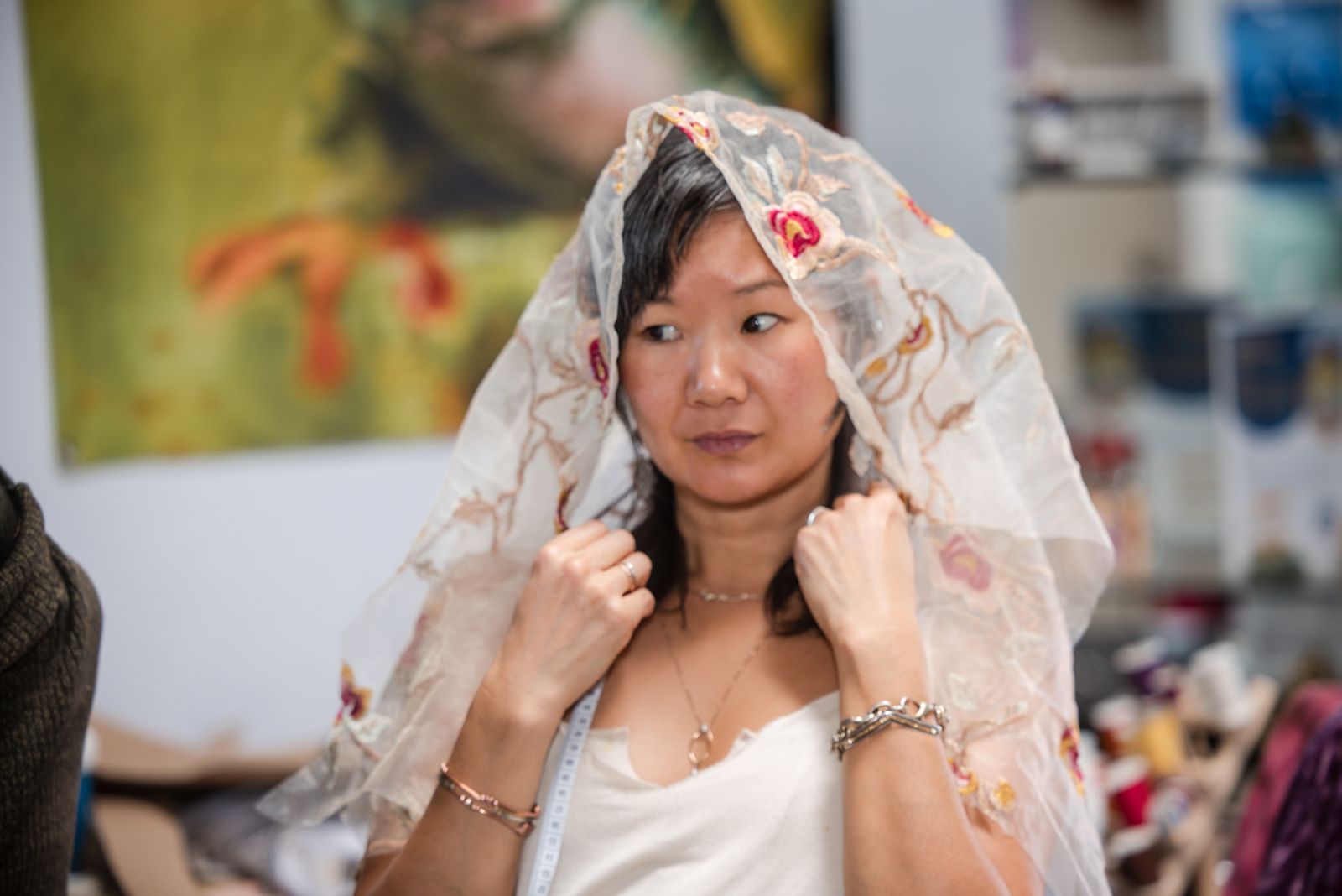 Model wearing a sheer floral veil